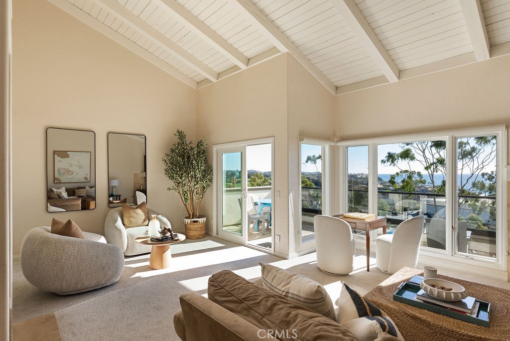 23274 Atlantis Way Dana Point, CA 92629 - Photo 17 of 53 a living room with furniture and a large window