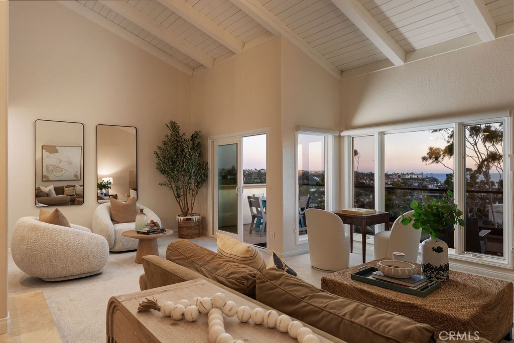 23274 Atlantis Way Dana Point, CA 92629 - Photo 18 of 53 a living room with furniture and a large window