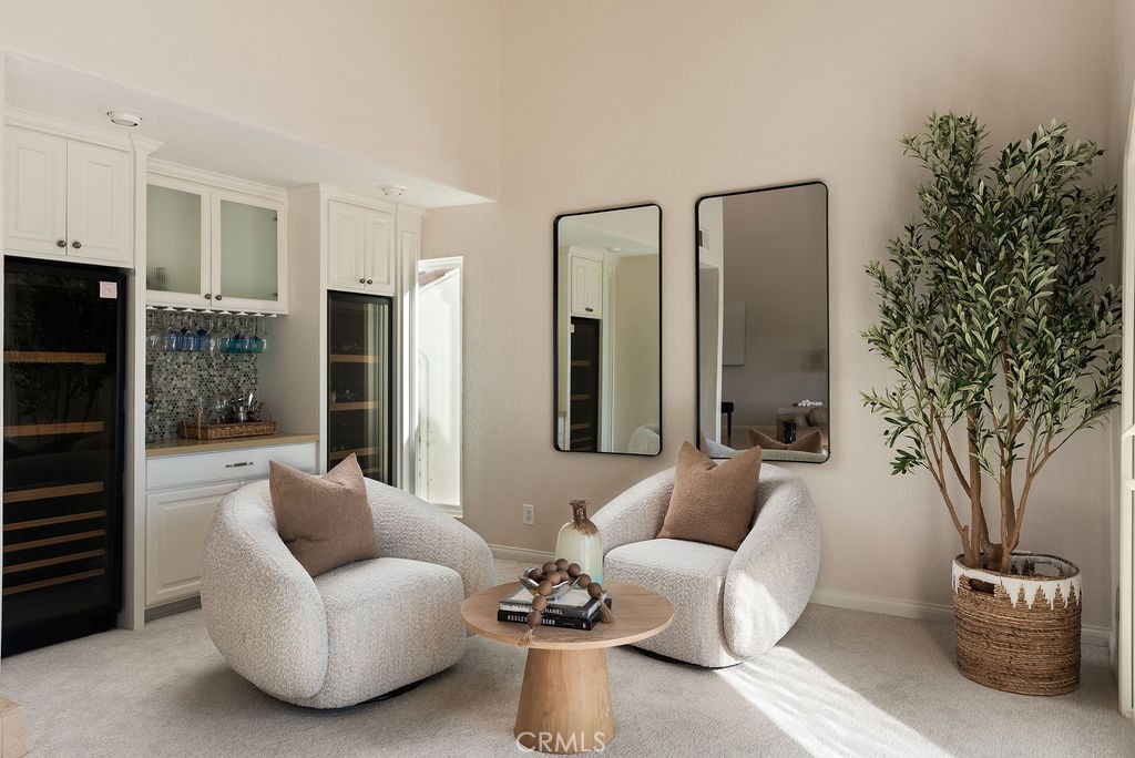 23274 Atlantis Way Dana Point, CA 92629 - Photo 23 of 53 a living room with furniture and a potted plant