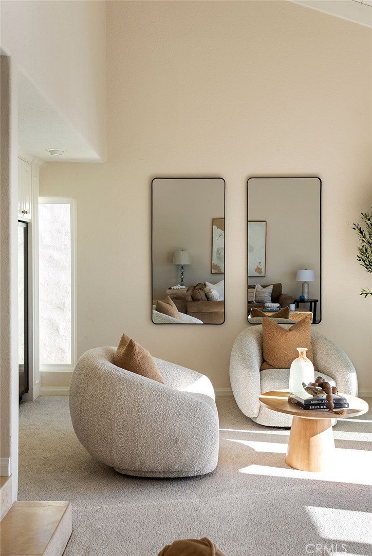 23274 Atlantis Way Dana Point, CA 92629 - Photo 23 of 53 a living room with furniture and a large window