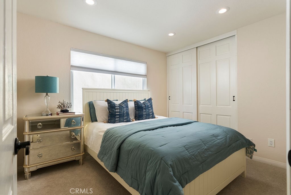 23274 Atlantis Way Dana Point, CA 92629 - Photo 31 of 53 a bedroom with a bed and a window