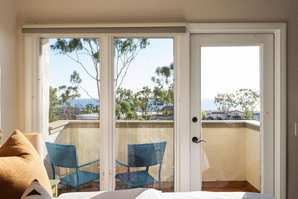 23274 Atlantis Way Dana Point, CA 92629 - Photo 39 of 53 a view of a room that has a bed and a table chair