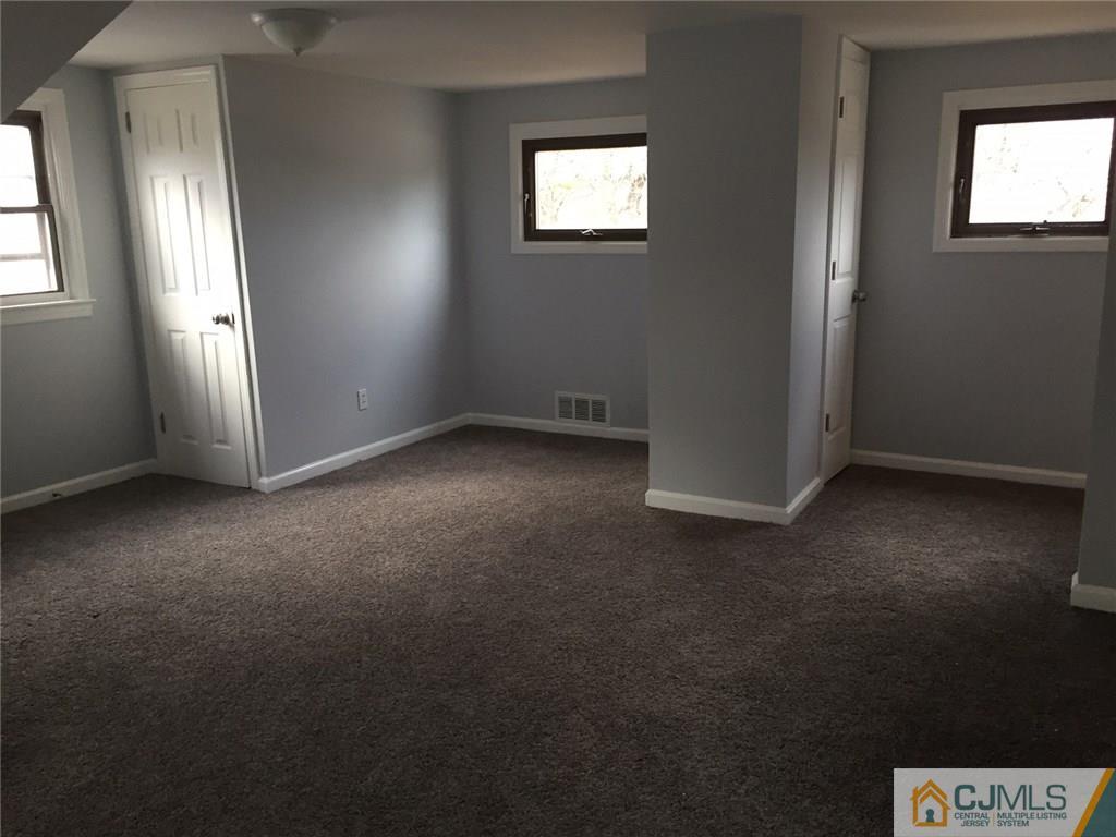 24 Sine Road Edison, NJ 08817 - Photo 8 of 11 an empty room with windows