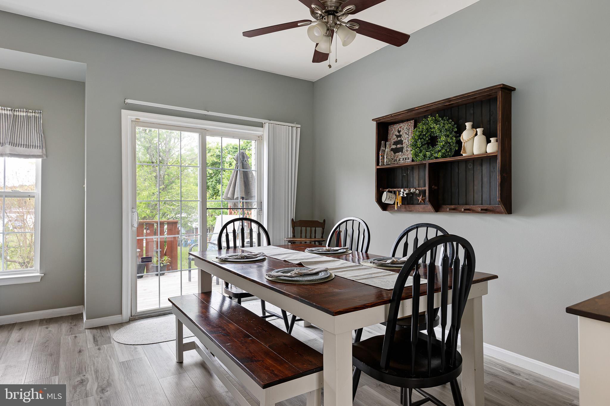16 Highland Circle Newark, DE 19713 - Photo 6 of 20 a view of a a dining room with furniture window and wooden floor