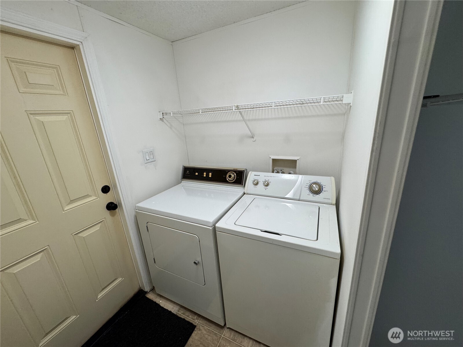 5705 Littlerock Road Southwest, Unit 30 Tumwater, WA 98512 - Photo 3 of 6 a utility room with dryer and washer