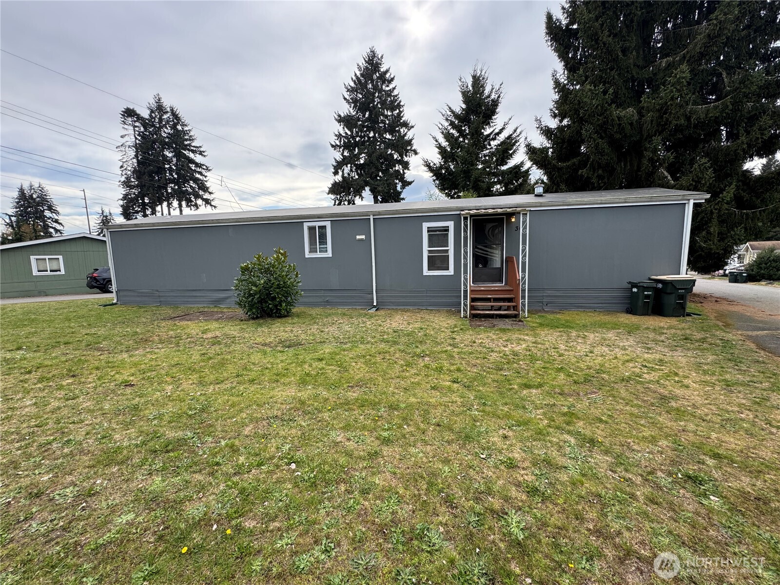 5705 Littlerock Road Southwest, Unit 30 Tumwater, WA 98512 - Photo 6 of 6 a backyard of a house