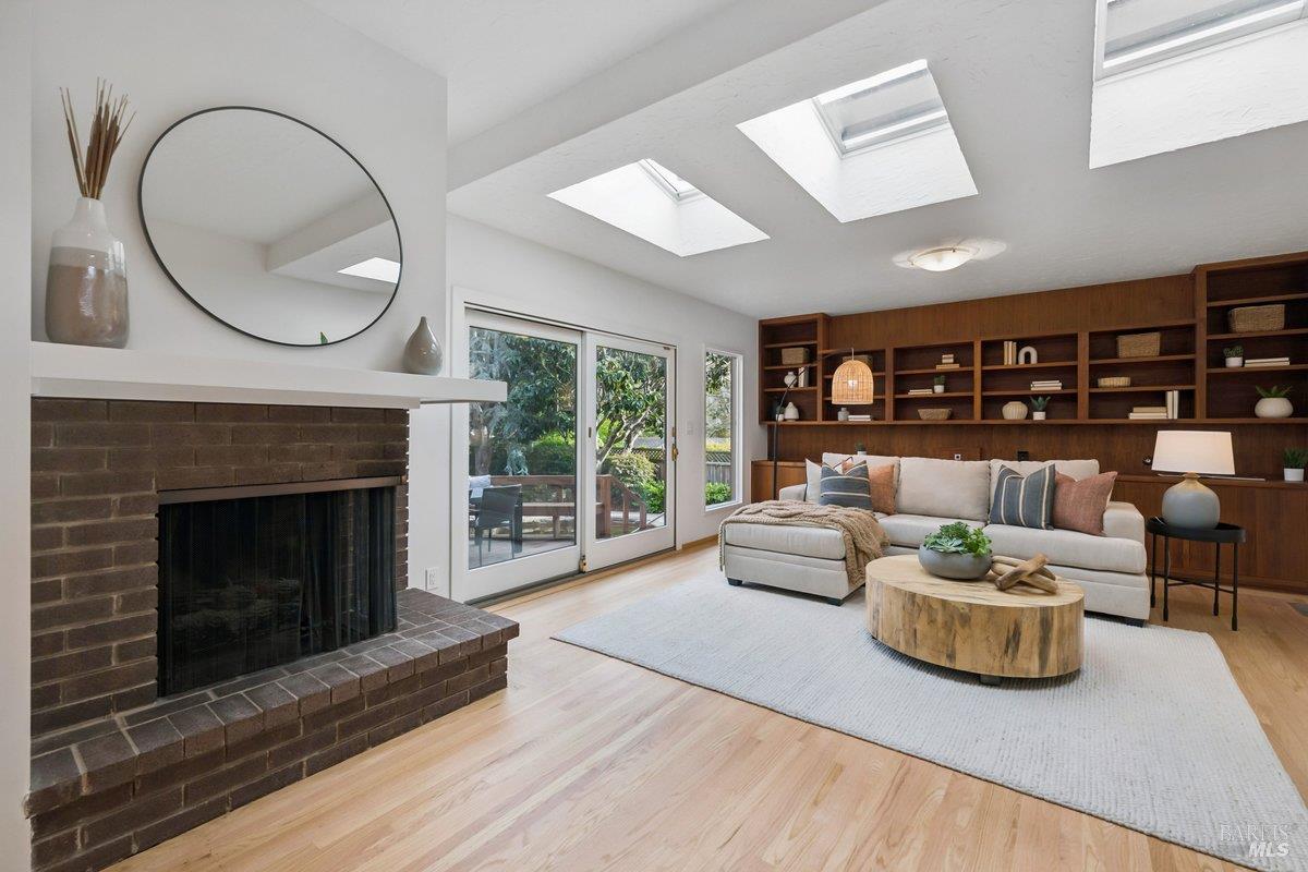 42 Underhill Road Mill Valley, CA 94941 - Photo 26 of 76 Family room with outdoor access and custom wood built-ins