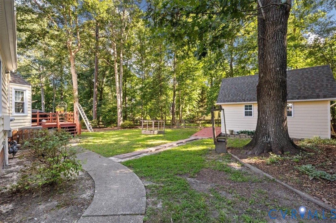 13905 Shadow Ridge Lane Midlothian, VA 23112 - Photo 51 of 55 Expansive backyard featuring a manicured lawn, est