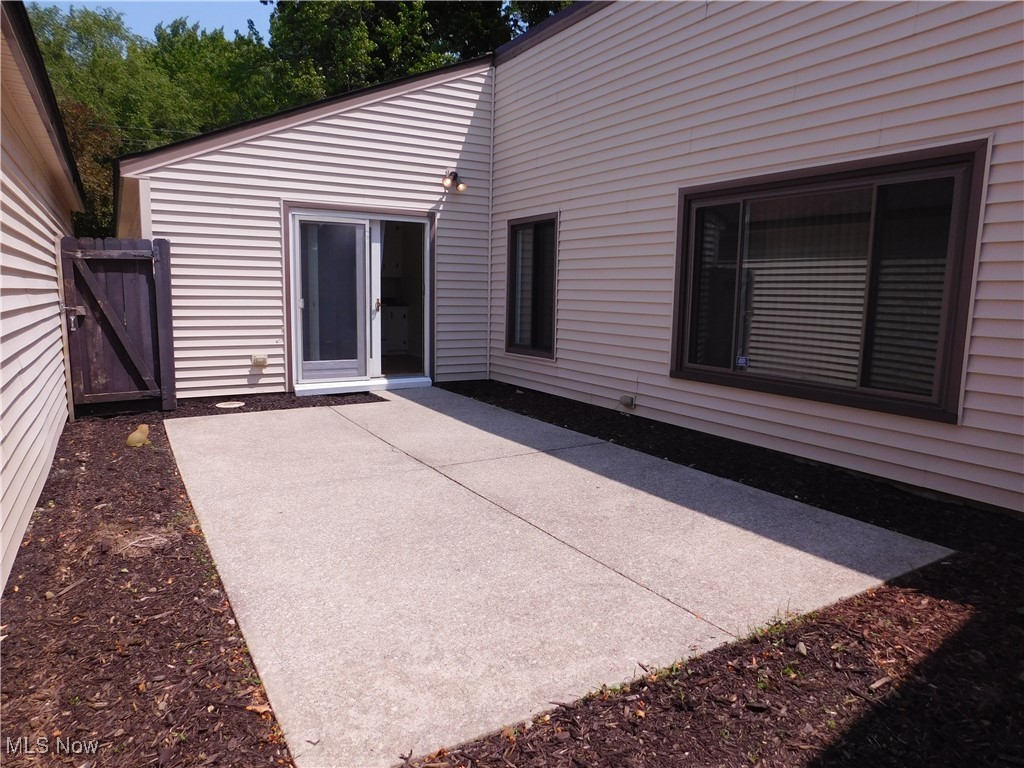 32885 Mills Road North Ridgeville, OH 44039 - Photo 5 of 42 Sliders off the kitchen to private patio/courtyard
