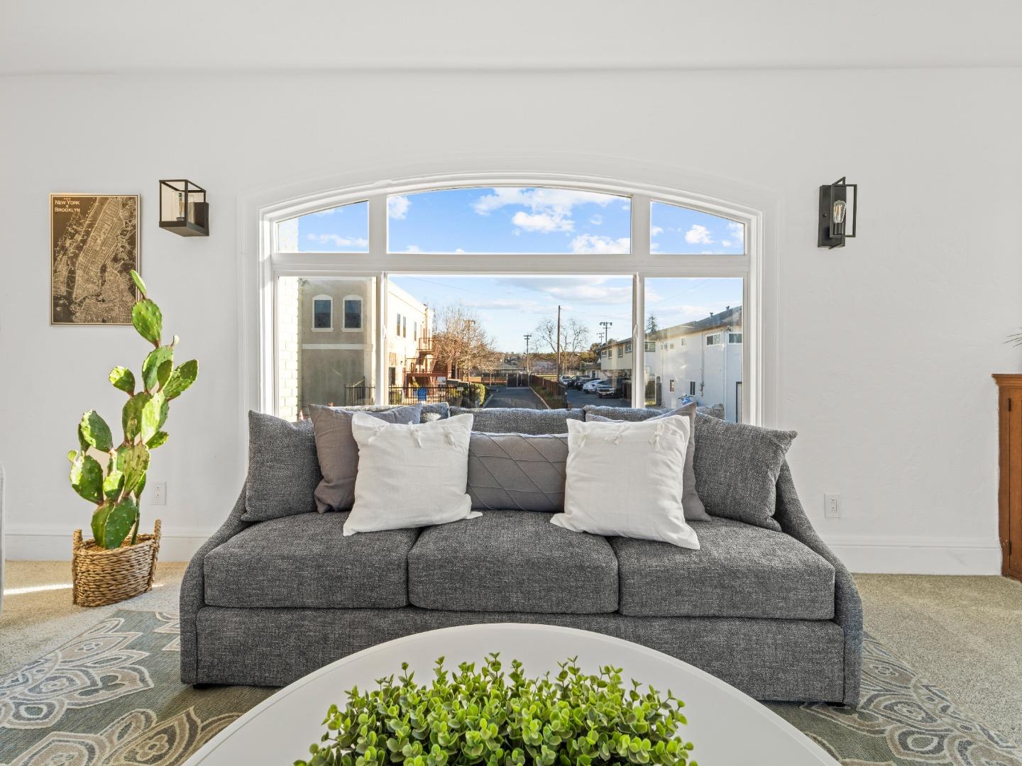 524 Fourth Street Rodeo, CA 94572 - Photo 14 of 36 a living room with furniture and a large window