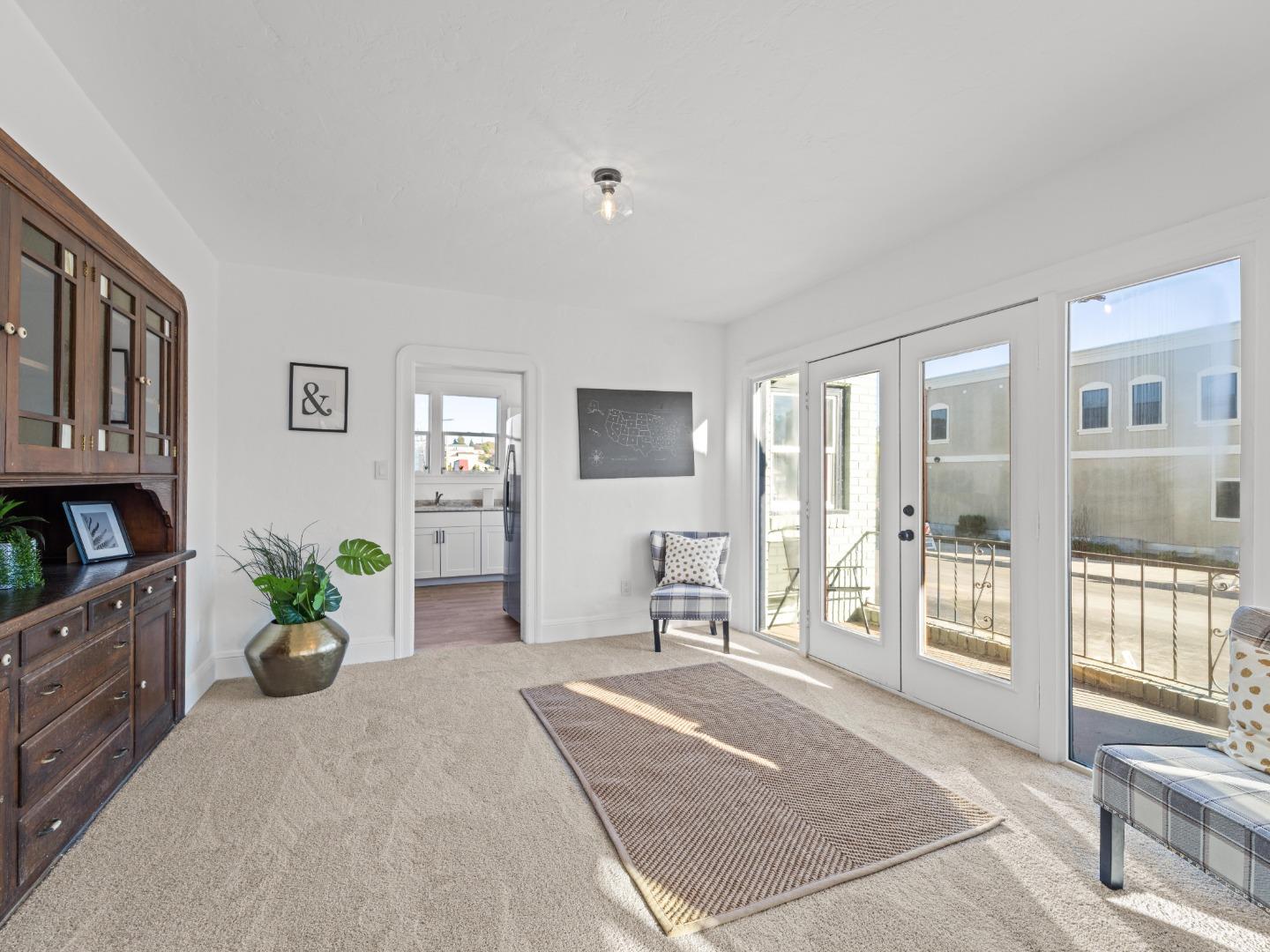 524 Fourth Street Rodeo, CA 94572 - Photo 25 of 36 a living room with furniture and a potted plant