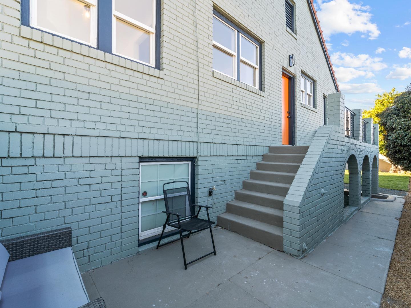 524 Fourth Street Rodeo, CA 94572 - Photo 6 of 36 a view of a patio with table and chairs with wooden fence and plants