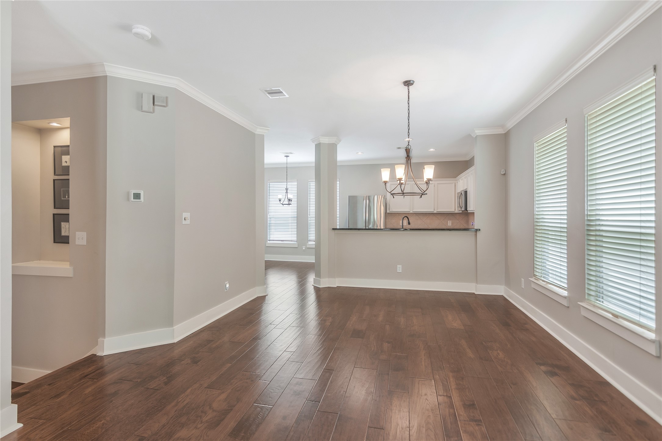 1207 Nagle Street Houston, TX 77003 - Photo 12 of 26 The dining room area has ample space for your round or formal table comfortably accomodating at least 6 persons. Also notice, the nice art niche at the stairwell landing!