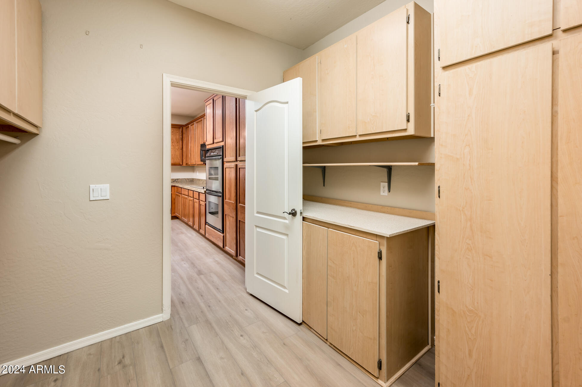 2740 West Florimond Road Phoenix, AZ 85086 - Photo 18 of 44 Laundry Room Storage and Pantry