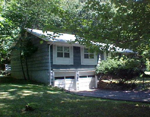 64 Stoneleigh Road Trumbull, CT 06611 - Photo 1 of 1 a view of a house with a yard