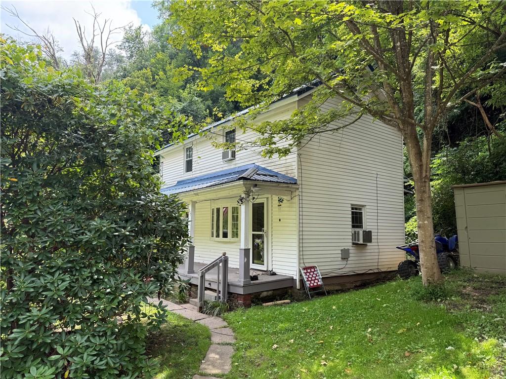 337 Coal Valley Road Clairton, PA 15025 - Photo 2 of 30 a view of a house with a backyard