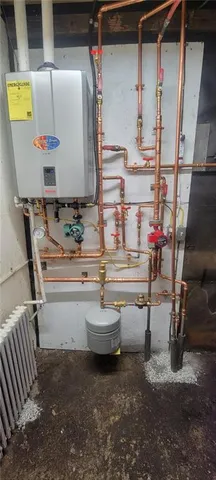 a bathroom with a sink and mirror