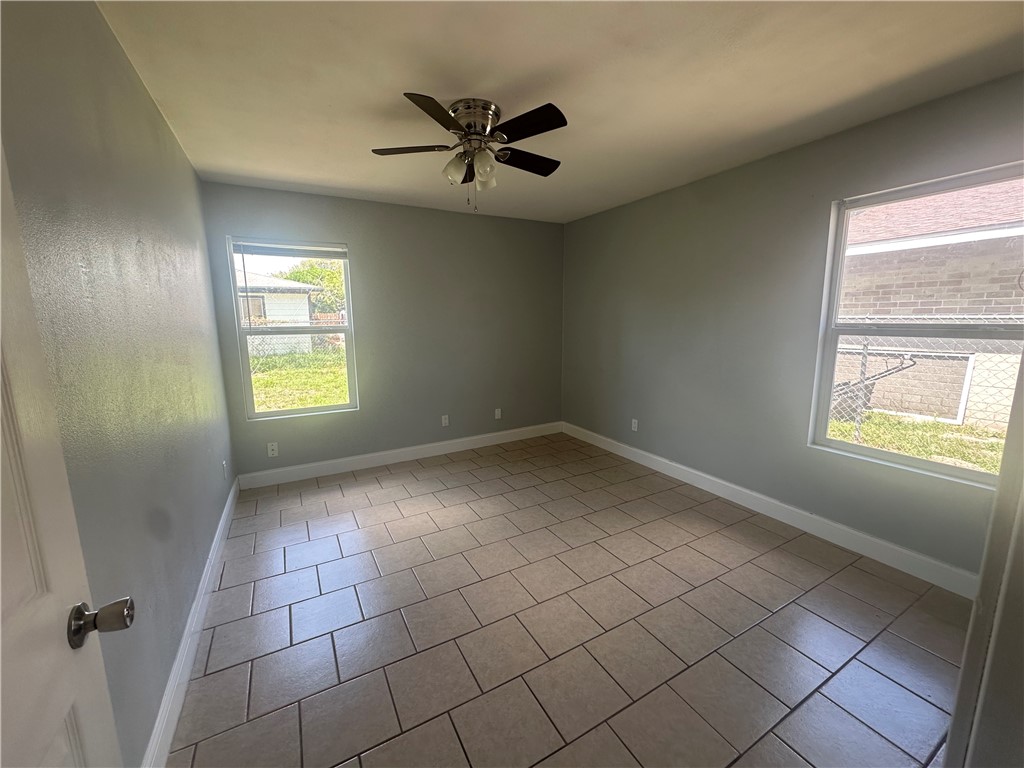 2115 Zephyr Ingleside, TX 78362 - Photo 8 of 10 a view of an empty room and window