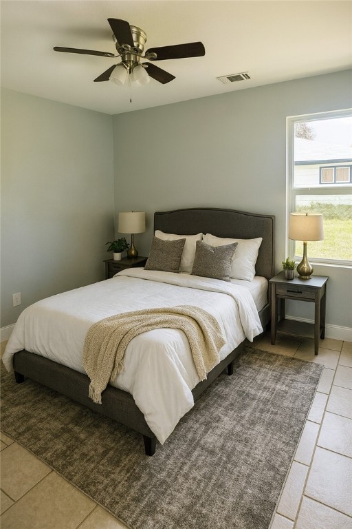 2115 Zephyr Ingleside, TX 78362 - Photo 9 of 10 a bedroom with a bed and a chandelier