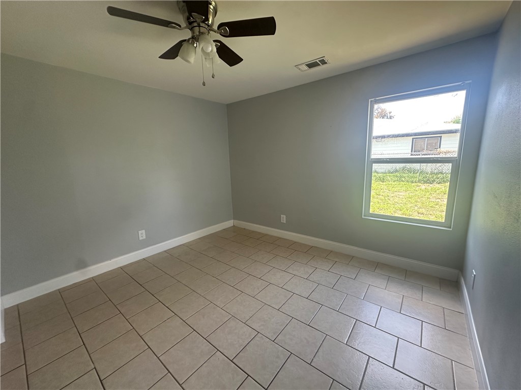 2115 Zephyr Ingleside, TX 78362 - Photo 10 of 10 a view of an empty room and window