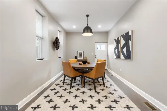 a view of a workspace with furniture