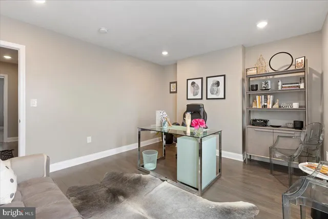 a view of a workspace with furniture