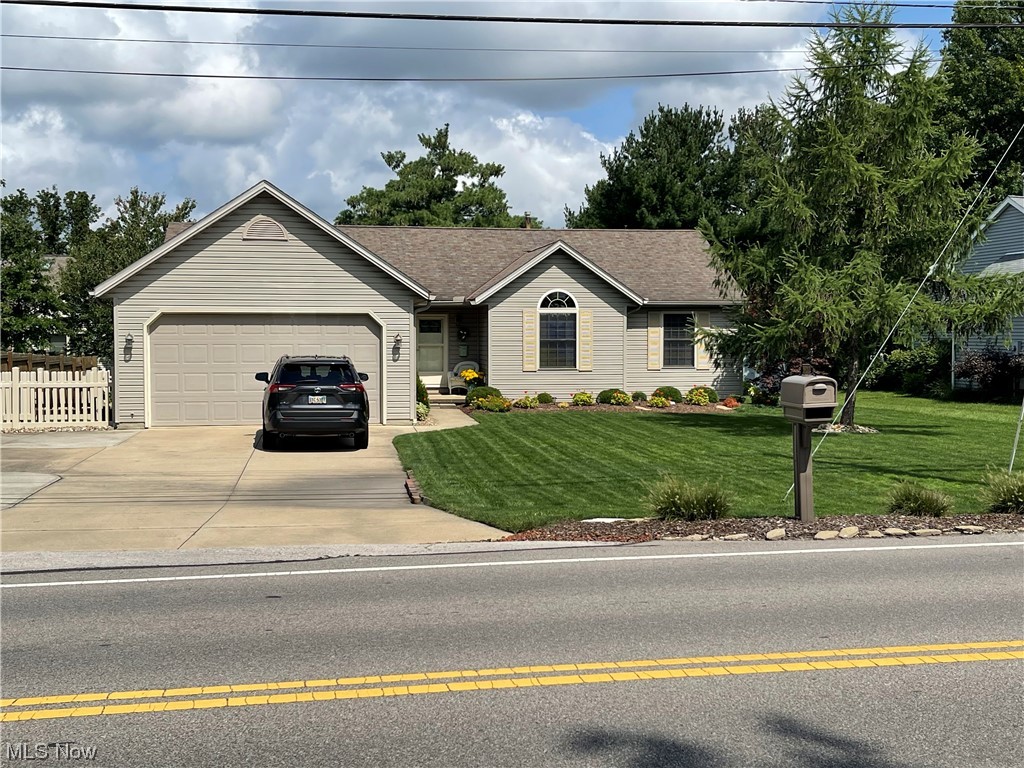 39212 Chestnut Ridge Road Elyria, OH 44035 - Photo 27 of 27 Single story home with garage and a front yard
