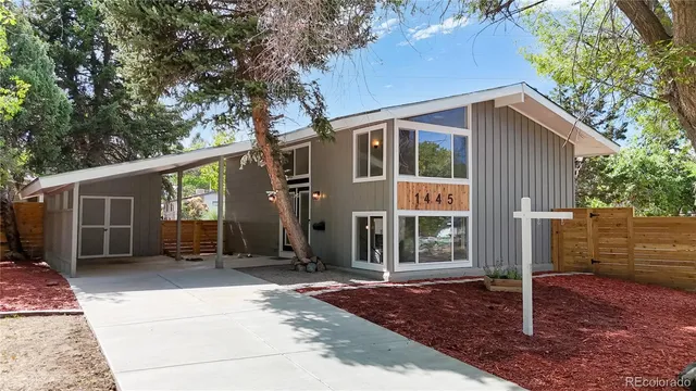 a front view of a house with a porch