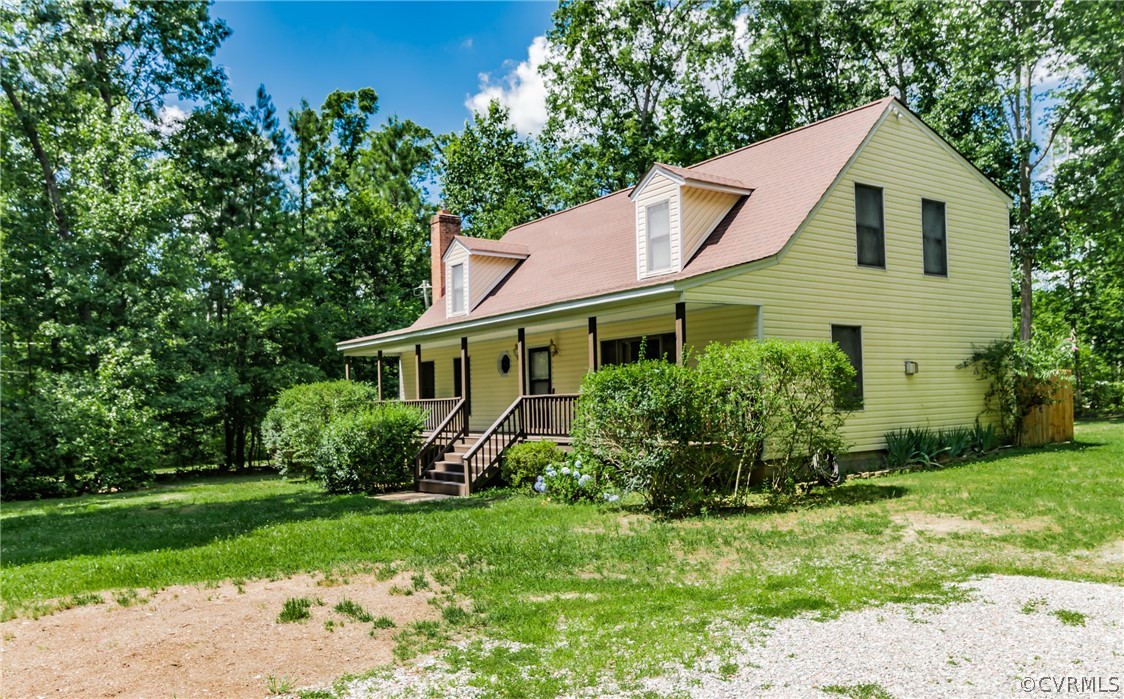 12720 River Road Chesterfield, VA 23838 - Photo 2 of 33 a view of a house with garden and yard