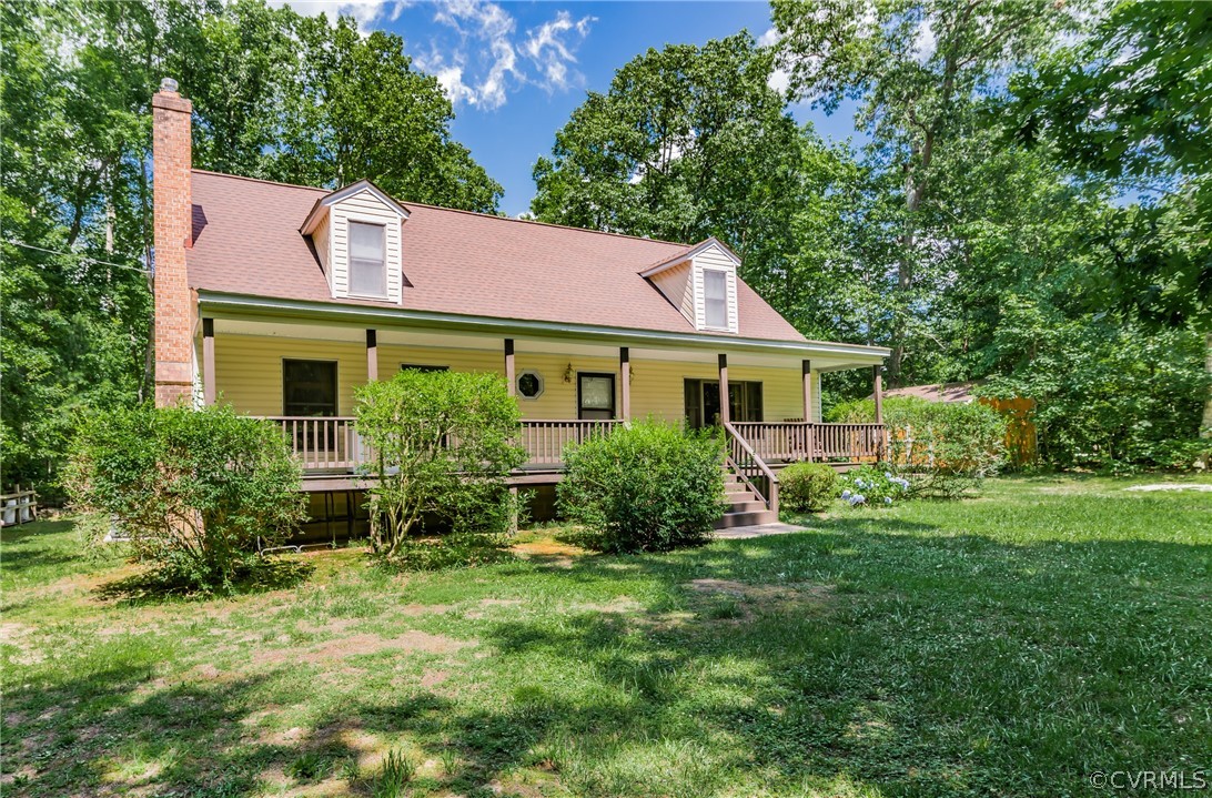 12720 River Road Chesterfield, VA 23838 - Photo 3 of 33 a view of a house with yard and a garden