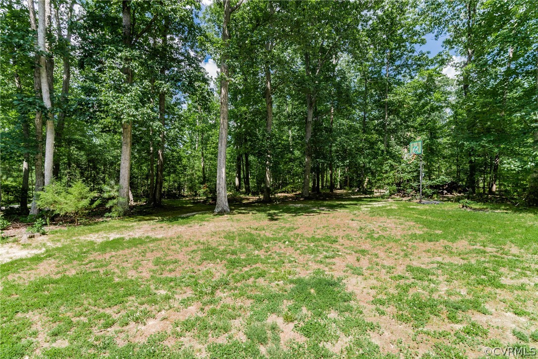 12720 River Road Chesterfield, VA 23838 - Photo 32 of 33 a view of outdoor space with deck and yard