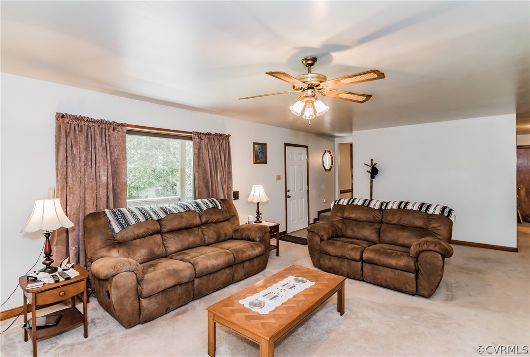 12720 River Road Chesterfield, VA 23838 - Photo 10 of 33 a living room with furniture ceiling fan and a window