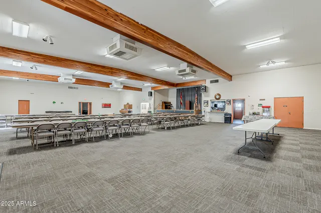 a view of a a dining room with furniture