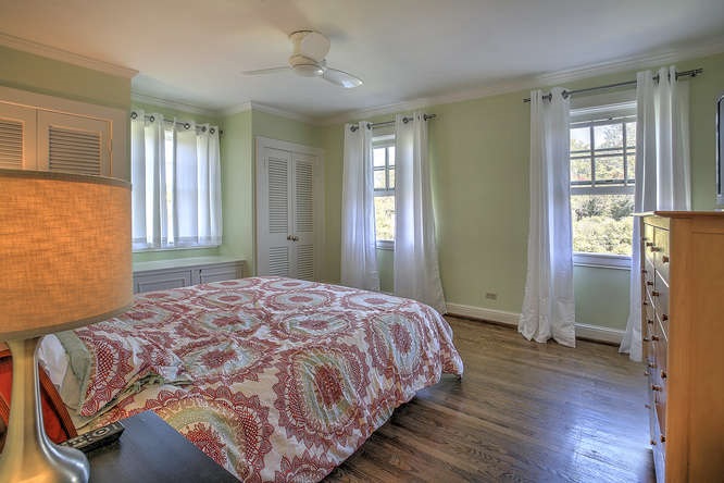 1454 Rugby Road Charlottesville, VA 22903 - Photo 19 of 33 a bedroom with a bed and a window