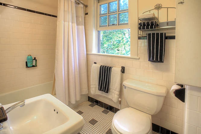 1454 Rugby Road Charlottesville, VA 22903 - Photo 20 of 33 a bathroom with a sink toilet and shower