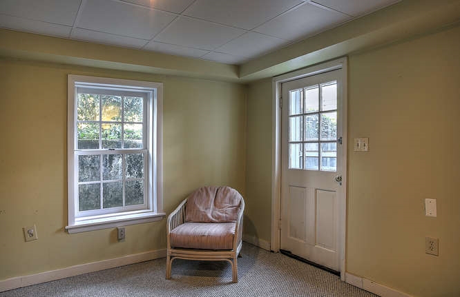 1454 Rugby Road Charlottesville, VA 22903 - Photo 21 of 33 a living room with furniture and a window