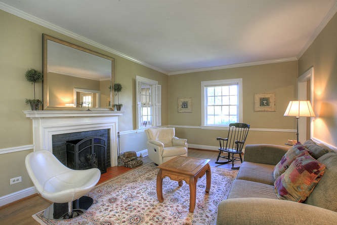 1454 Rugby Road Charlottesville, VA 22903 - Photo 5 of 33 a living room with furniture a window and a fireplace