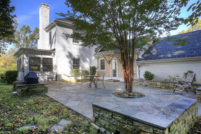 1454 Rugby Road Charlottesville, VA 22903 - Photo 7 of 33 a front view of a house with garden