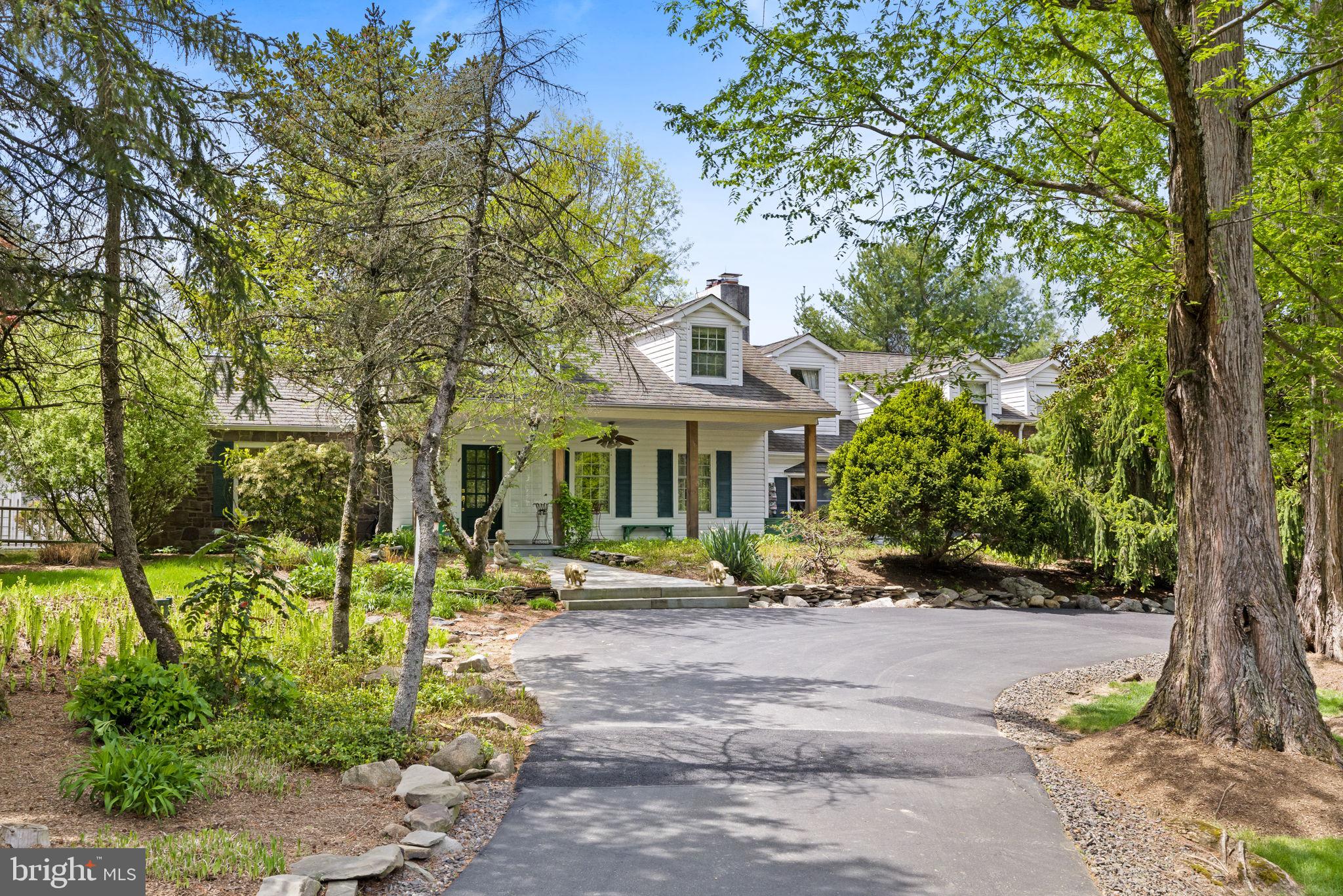 65 Covered Bridge Road New Hope, PA 18938 - Photo 1 of 117 a front view of a house with a yard