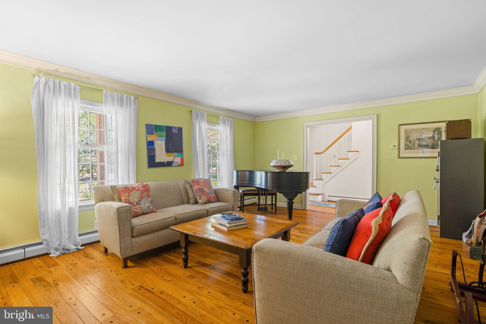 65 Covered Bridge Road New Hope, PA 18938 - Photo 20 of 117 a living room with furniture a flat screen tv and a table