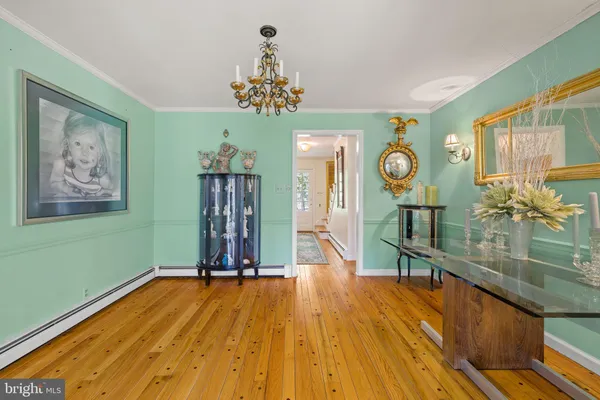 a kitchen with stainless steel appliances granite countertop a sink and a microwave