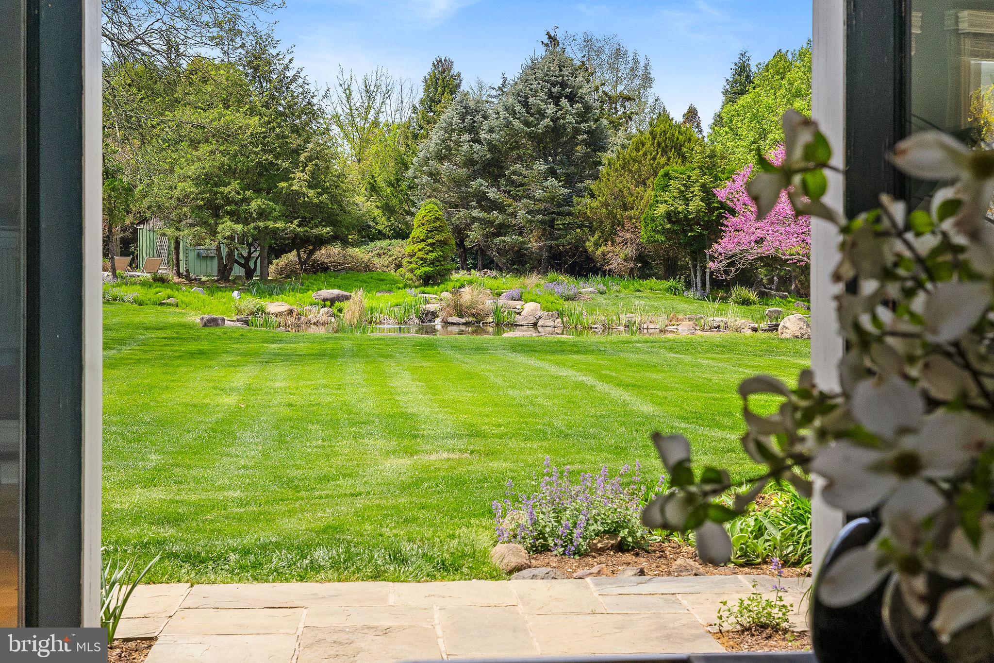 65 Covered Bridge Road New Hope, PA 18938 - Photo 36 of 117 a view of a garden with an outdoor space