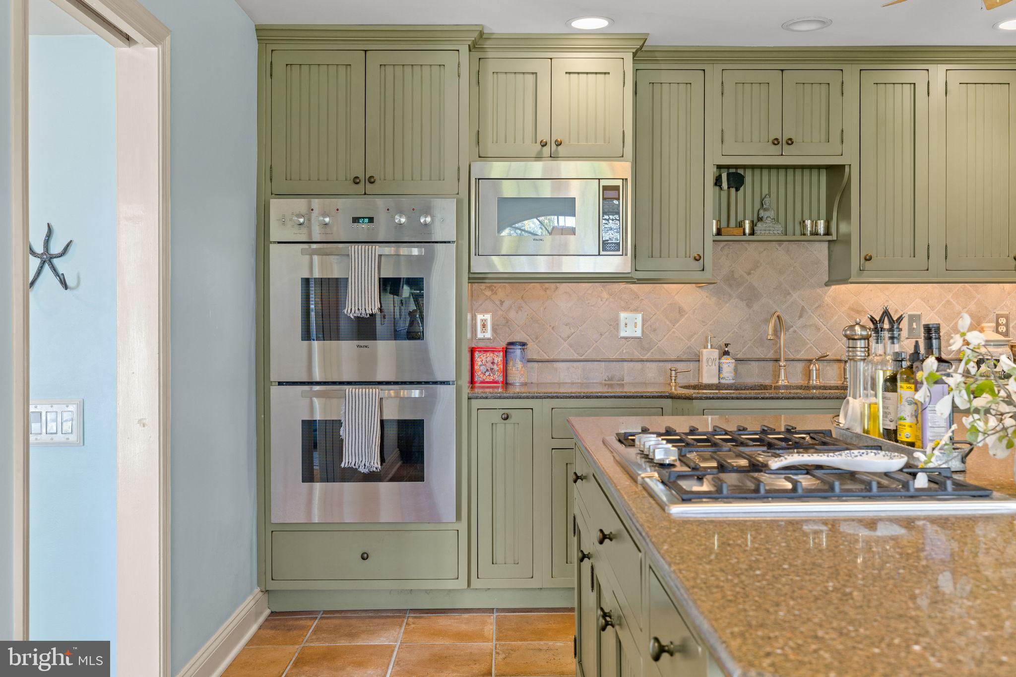 65 Covered Bridge Road New Hope, PA 18938 - Photo 47 of 117 a kitchen with a stove and a refrigerator