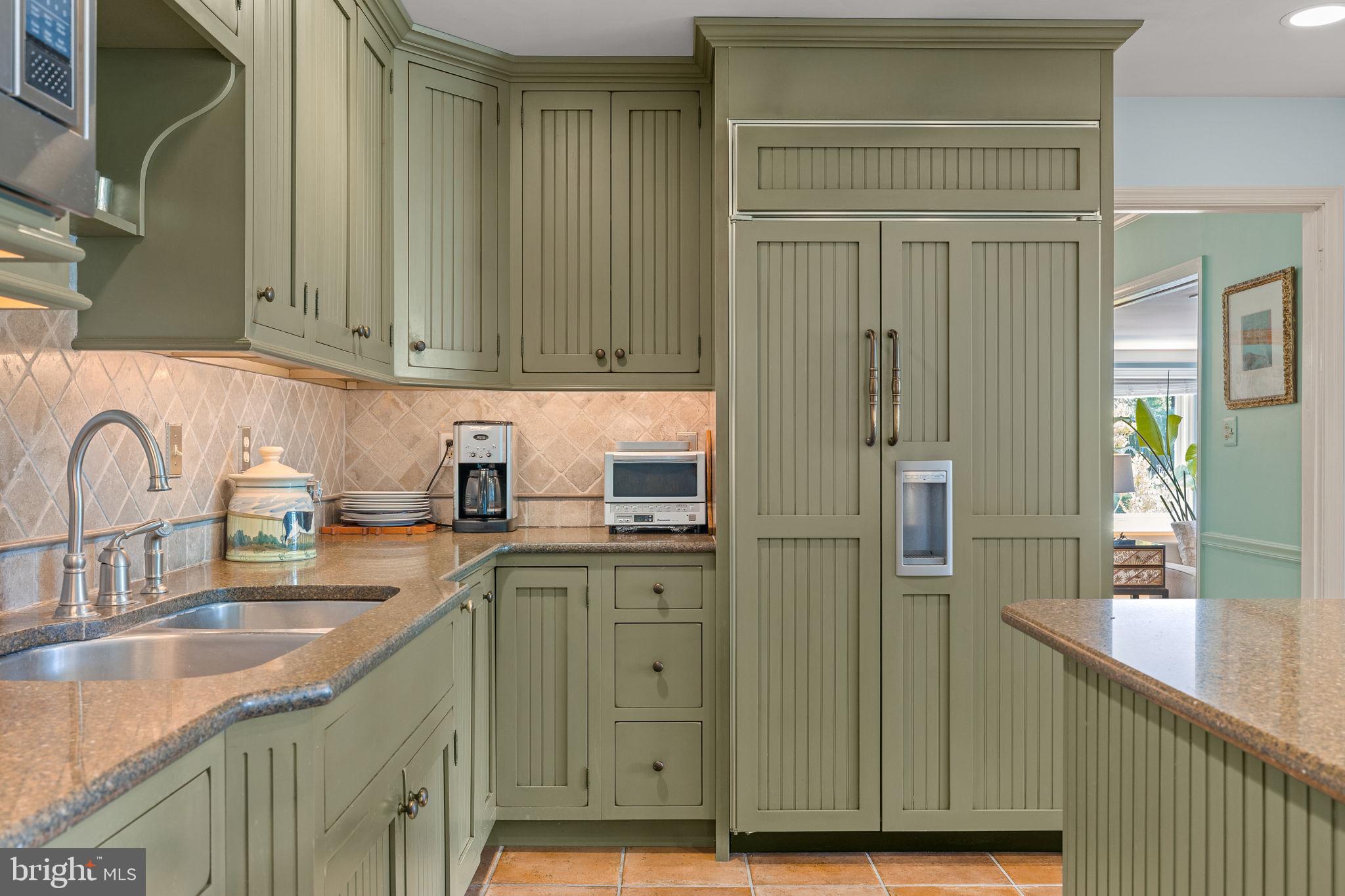 65 Covered Bridge Road New Hope, PA 18938 - Photo 48 of 117 a kitchen with stainless steel appliances granite countertop a sink a stove and cabinets