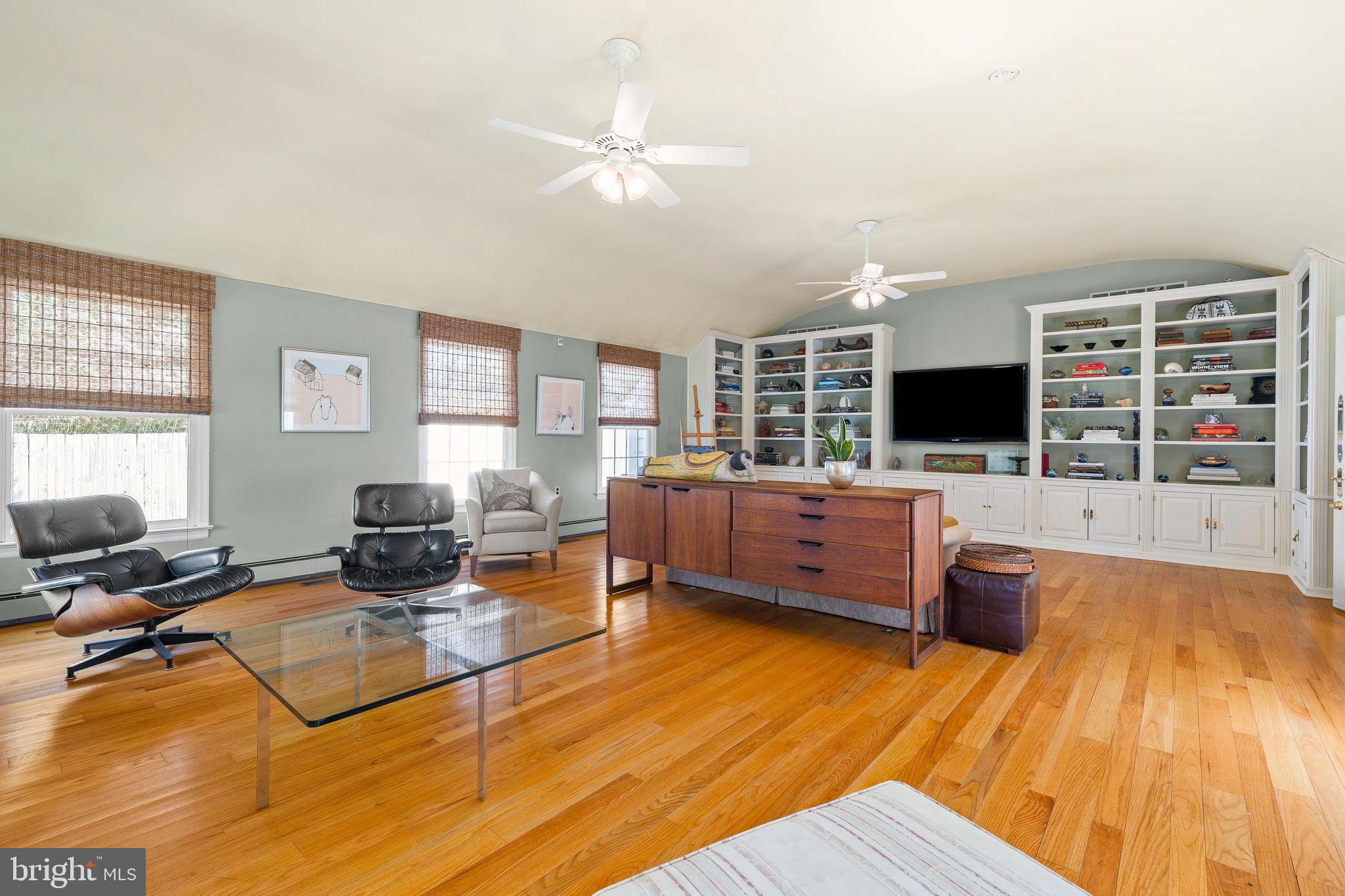 65 Covered Bridge Road New Hope, PA 18938 - Photo 59 of 117 a living room with furniture and a flat screen tv