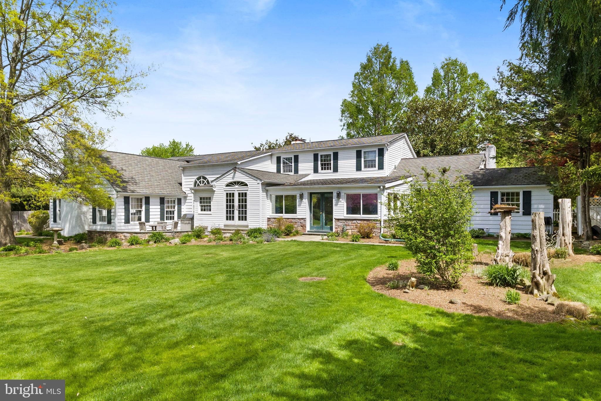 65 Covered Bridge Road New Hope, PA 18938 - Photo 79 of 117 a front view of a house with a garden
