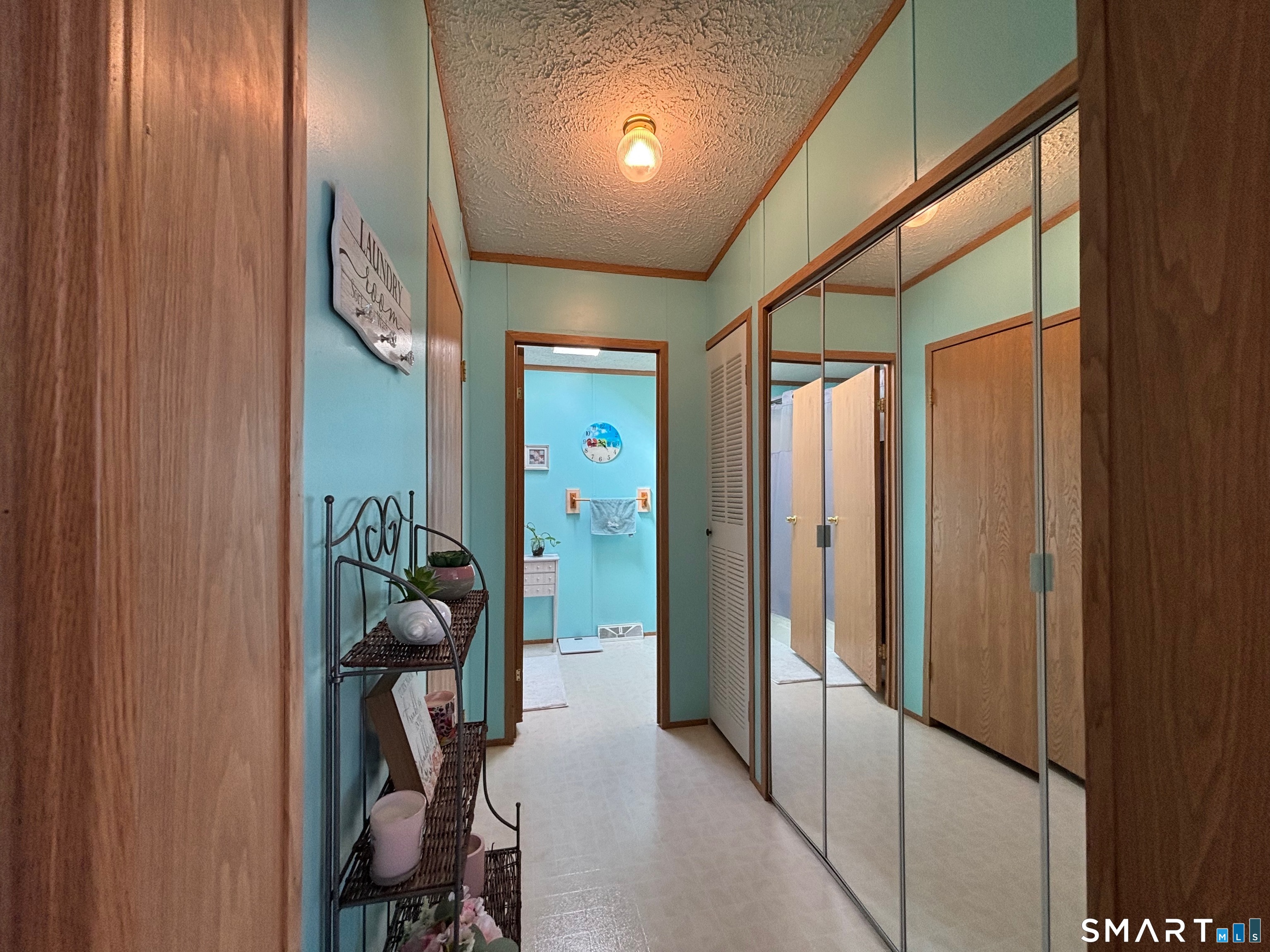 17 Haley Lane Windham, CT 06256 - Photo 28 of 40 Opening to laundry room and main full bath - off hall