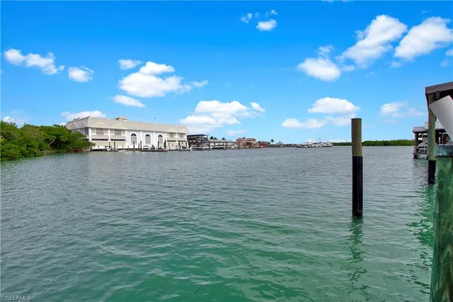 a view of a lake and sunset