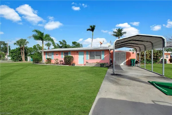 a front view of house with yard