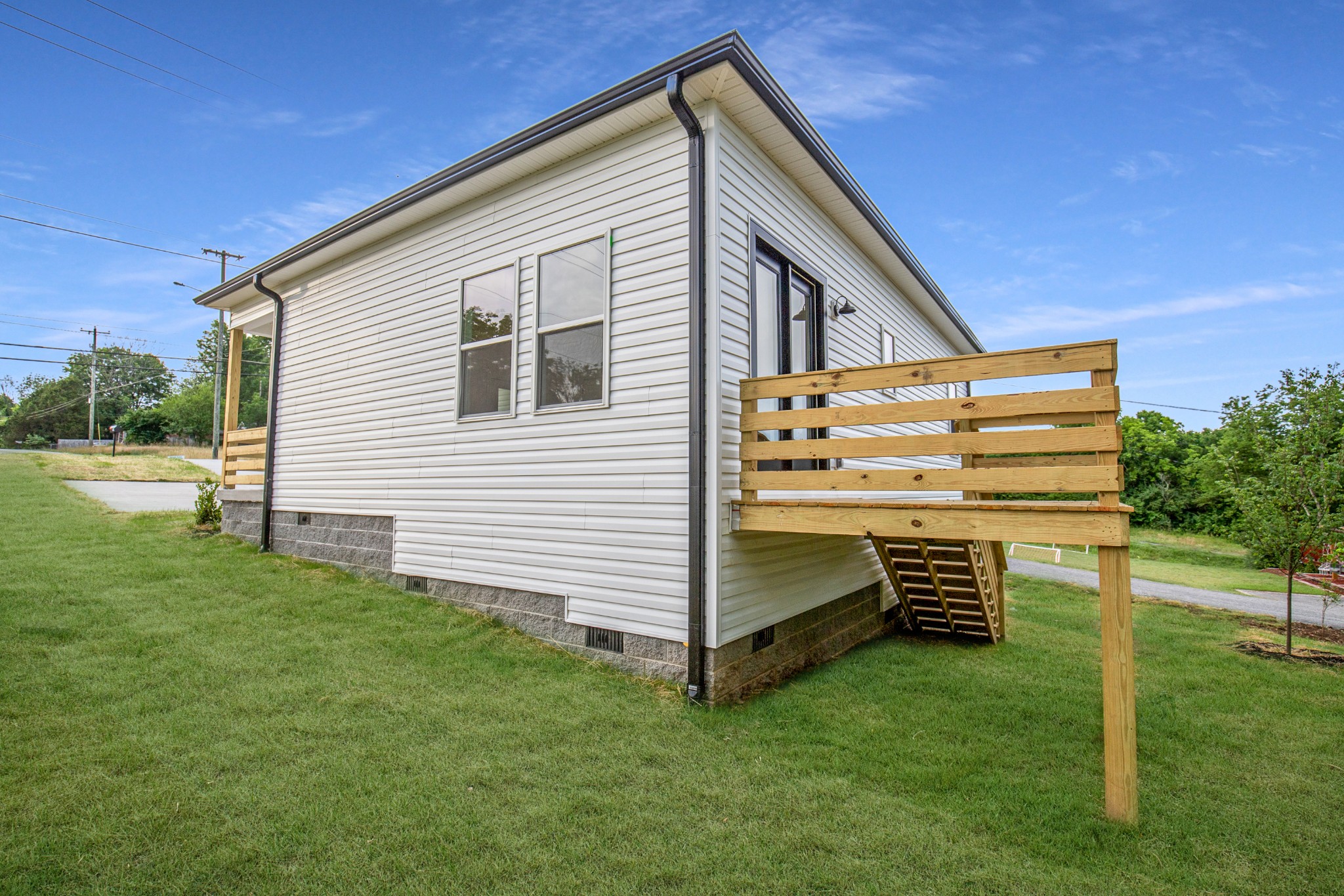 308 Larkin Springs Road Madison, TN 37115 - Photo 4 of 25 a view of backyard of house and deck